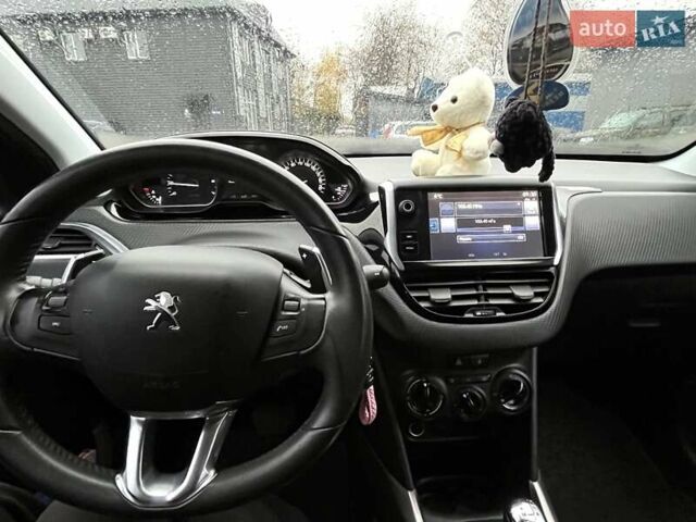 Пежо 2008 2015 в Сумах на Automoto.ua Коричневый Пежо 2008, объемом двигателя 1.2 л и пробегом 100 тыс. км за 10500 $, фото 9 на Automoto.ua