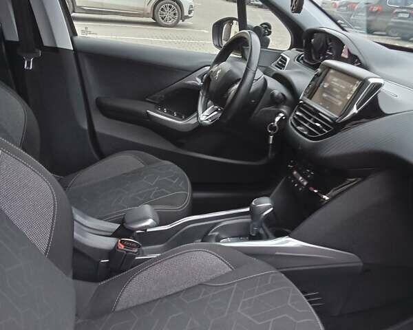 Коричневый Пежо 2008, объемом двигателя 1.2 л и пробегом 58 тыс. км за 11500 $, фото 19 на Automoto.ua