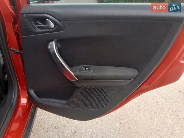 Красный Пежо 2008, объемом двигателя 1.2 л и пробегом 49 тыс. км за 9000 $, фото 14 на Automoto.ua