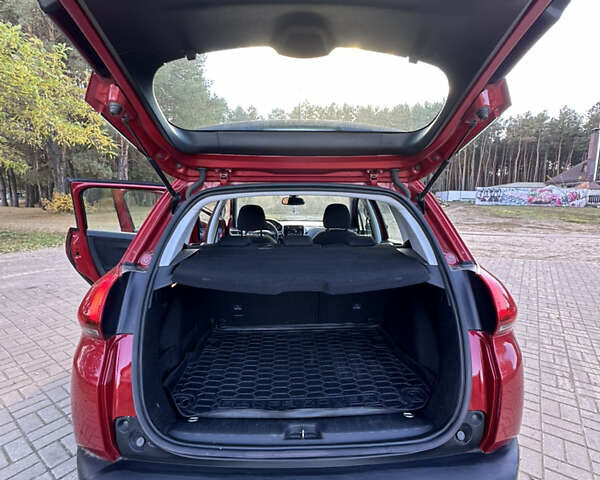 Червоний Пежо 2008, об'ємом двигуна 1.2 л та пробігом 159 тис. км за 10999 $, фото 4 на Automoto.ua