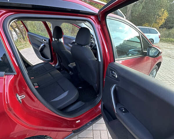 Червоний Пежо 2008, об'ємом двигуна 1.2 л та пробігом 159 тис. км за 10999 $, фото 3 на Automoto.ua