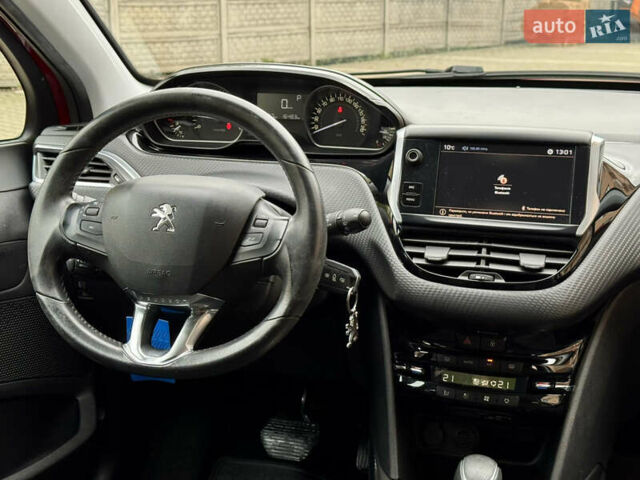 Червоний Пежо 2008, об'ємом двигуна 1.2 л та пробігом 130 тис. км за 10800 $, фото 21 на Automoto.ua