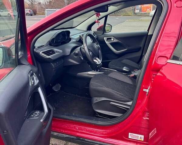 Червоний Пежо 2008, об'ємом двигуна 1.2 л та пробігом 37 тис. км за 14000 $, фото 5 на Automoto.ua