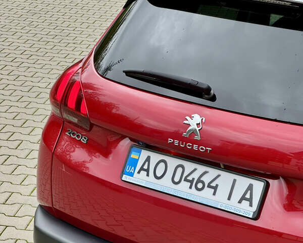 Червоний Пежо 2008, об'ємом двигуна 1.2 л та пробігом 130 тис. км за 10800 $, фото 17 на Automoto.ua