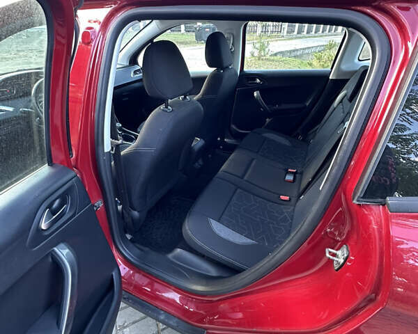 Червоний Пежо 2008, об'ємом двигуна 1.2 л та пробігом 159 тис. км за 10999 $, фото 5 на Automoto.ua