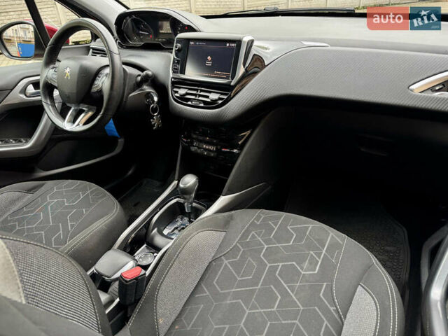 Червоний Пежо 2008, об'ємом двигуна 1.2 л та пробігом 130 тис. км за 10800 $, фото 19 на Automoto.ua