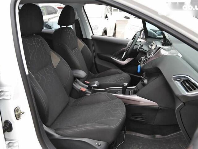 Пежо 2008, объемом двигателя 1.2 л и пробегом 134 тыс. км за 10900 $, фото 10 на Automoto.ua