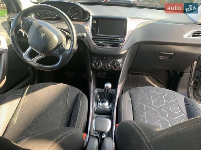 Серый Пежо 2008, объемом двигателя 1.2 л и пробегом 83 тыс. км за 10500 $, фото 27 на Automoto.ua