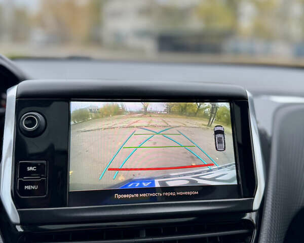 Серый Пежо 2008, объемом двигателя 1.2 л и пробегом 67 тыс. км за 13600 $, фото 18 на Automoto.ua