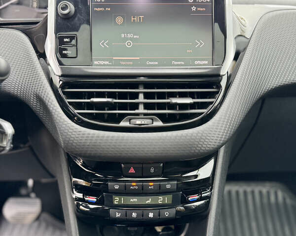 Серый Пежо 2008, объемом двигателя 1.2 л и пробегом 67 тыс. км за 13600 $, фото 17 на Automoto.ua