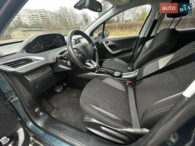 Зеленый Пежо 2008, объемом двигателя 1.2 л и пробегом 85 тыс. км за 9900 $, фото 11 на Automoto.ua