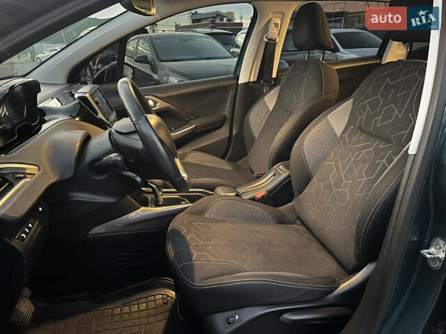 Зелений Пежо 2008, об'ємом двигуна 1.2 л та пробігом 116 тис. км за 11750 $, фото 6 на Automoto.ua