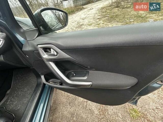 Зеленый Пежо 2008, объемом двигателя 1.2 л и пробегом 85 тыс. км за 9900 $, фото 13 на Automoto.ua