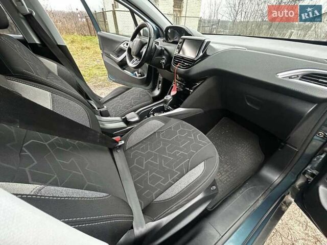 Зеленый Пежо 2008, объемом двигателя 1.2 л и пробегом 85 тыс. км за 9900 $, фото 15 на Automoto.ua