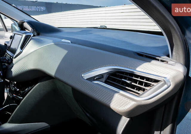 Зелений Пежо 2008, об'ємом двигуна 1.2 л та пробігом 45 тис. км за 12500 $, фото 33 на Automoto.ua