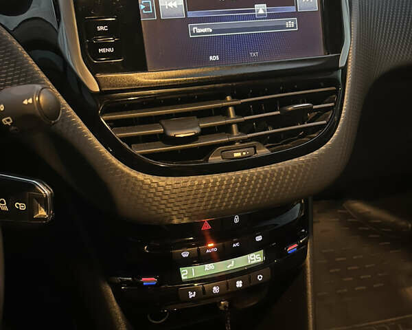 Зелений Пежо 2008, об'ємом двигуна 1.2 л та пробігом 116 тис. км за 11750 $, фото 13 на Automoto.ua