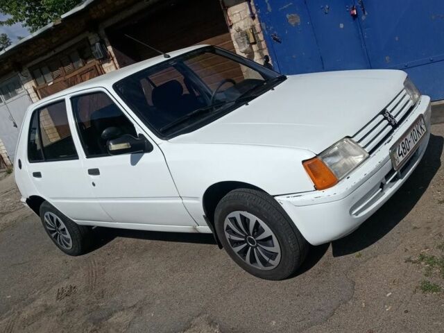 Белый Пежо 205, объемом двигателя 2 л и пробегом 285 тыс. км за 1500 $, фото 4 на Automoto.ua
