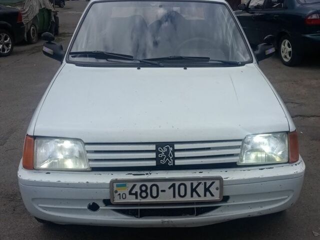 Белый Пежо 205, объемом двигателя 2 л и пробегом 285 тыс. км за 1500 $, фото 3 на Automoto.ua