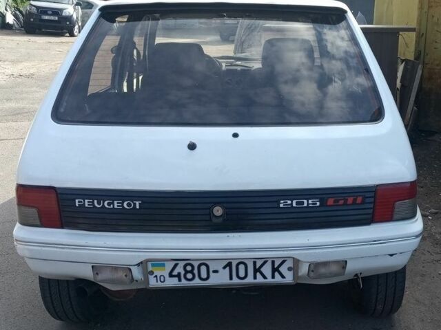 Белый Пежо 205, объемом двигателя 2 л и пробегом 285 тыс. км за 1500 $, фото 7 на Automoto.ua