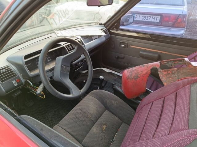 Красный Пежо 205, объемом двигателя 1.4 л и пробегом 100 тыс. км за 350 $, фото 2 на Automoto.ua