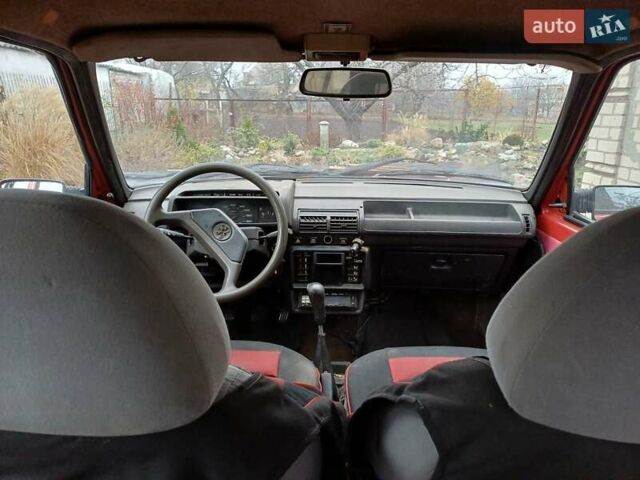 Червоний Пежо 205, об'ємом двигуна 1.4 л та пробігом 250 тис. км за 800 $, фото 19 на Automoto.ua