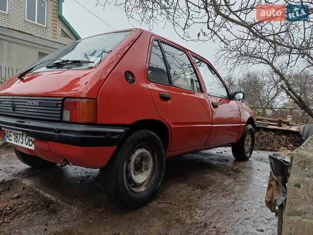 Червоний Пежо 205, об'ємом двигуна 1.4 л та пробігом 250 тис. км за 800 $, фото 2 на Automoto.ua