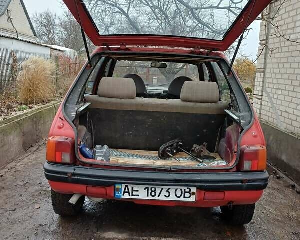 Червоний Пежо 205, об'ємом двигуна 1.4 л та пробігом 250 тис. км за 800 $, фото 17 на Automoto.ua