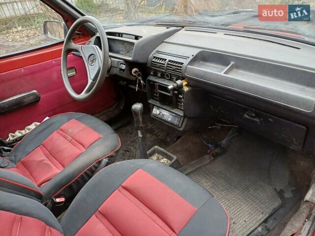 Червоний Пежо 205, об'ємом двигуна 1.4 л та пробігом 250 тис. км за 800 $, фото 16 на Automoto.ua