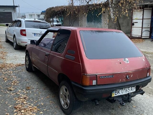 Красный Пежо 205, объемом двигателя 1.8 л и пробегом 200 тыс. км за 700 $, фото 2 на Automoto.ua