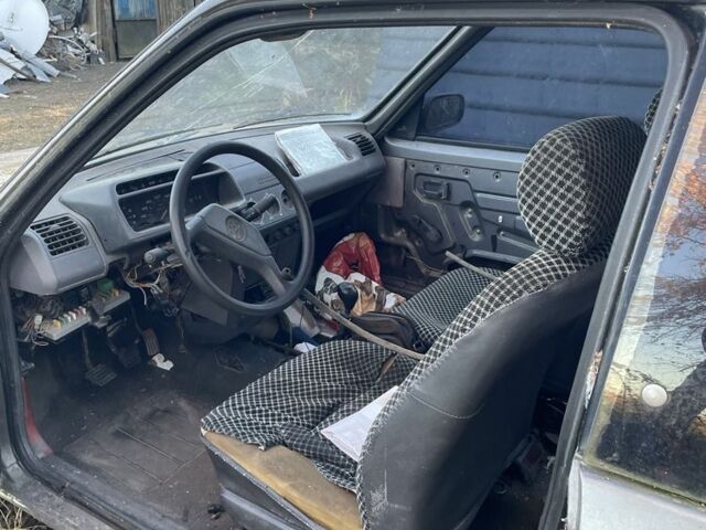 Сірий Пежо 205, об'ємом двигуна 1.1 л та пробігом 200 тис. км за 500 $, фото 4 на Automoto.ua