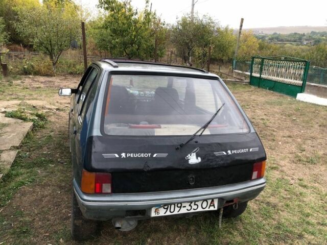 Серый Пежо 205, объемом двигателя 1.7 л и пробегом 200 тыс. км за 800 $, фото 1 на Automoto.ua