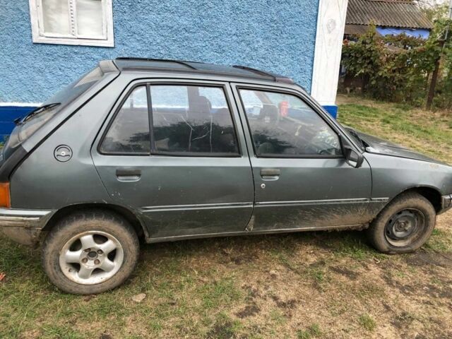 Серый Пежо 205, объемом двигателя 1.7 л и пробегом 200 тыс. км за 800 $, фото 3 на Automoto.ua