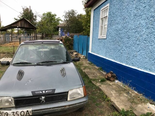 Серый Пежо 205, объемом двигателя 1.7 л и пробегом 200 тыс. км за 800 $, фото 2 на Automoto.ua