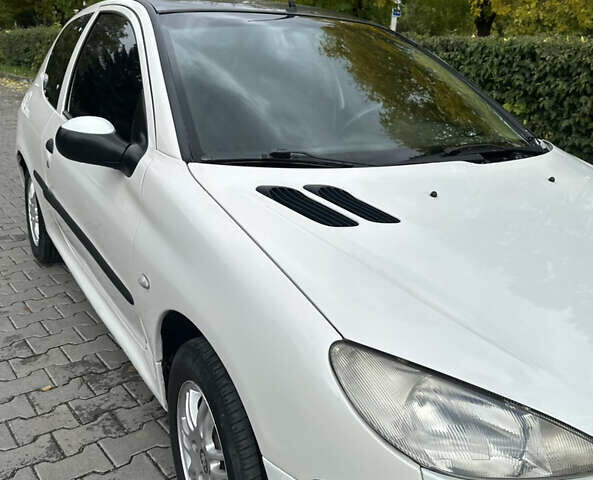 Білий Пежо 206, об'ємом двигуна 1.87 л та пробігом 268 тис. км за 3200 $, фото 6 на Automoto.ua