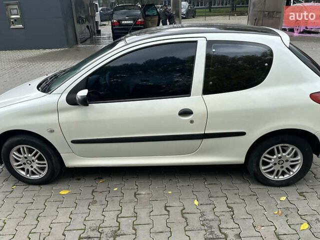 Білий Пежо 206, об'ємом двигуна 1.87 л та пробігом 268 тис. км за 3200 $, фото 10 на Automoto.ua