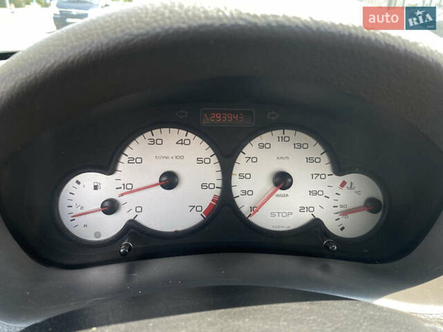 Белый Пежо 206, объемом двигателя 1.36 л и пробегом 293 тыс. км за 2500 $, фото 10 на Automoto.ua