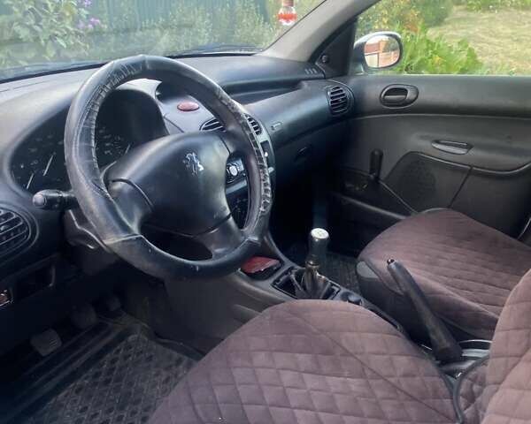 Білий Пежо 206, об'ємом двигуна 1.4 л та пробігом 231 тис. км за 2500 $, фото 3 на Automoto.ua