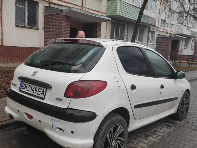 Белый Пежо 206, объемом двигателя 1.4 л и пробегом 201 тыс. км за 3700 $, фото 1 на Automoto.ua