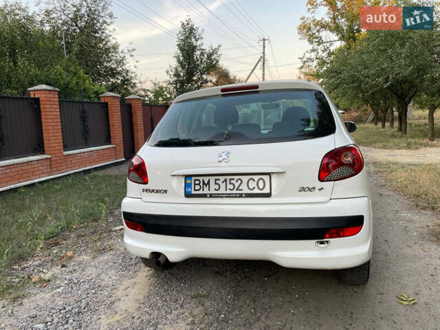 Белый Пежо 206, объемом двигателя 1.12 л и пробегом 180 тыс. км за 4500 $, фото 4 на Automoto.ua