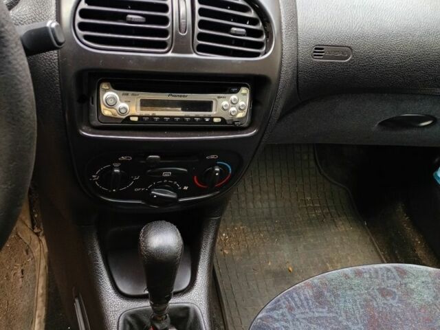 Белый Пежо 206, объемом двигателя 2 л и пробегом 360 тыс. км за 477 $, фото 10 на Automoto.ua