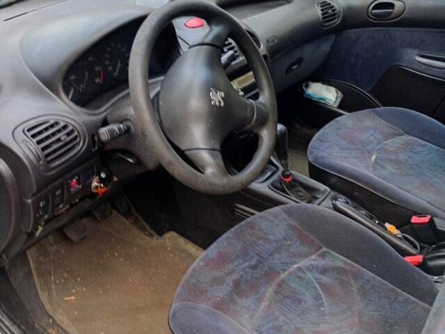 Белый Пежо 206, объемом двигателя 2 л и пробегом 360 тыс. км за 477 $, фото 9 на Automoto.ua