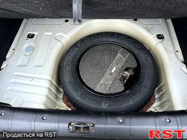 Білий Пежо 206, об'ємом двигуна 1.4 л та пробігом 229 тис. км за 2850 $, фото 9 на Automoto.ua