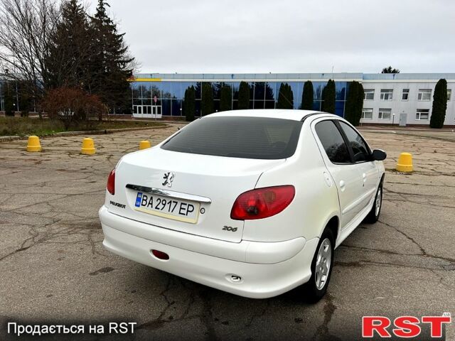 Білий Пежо 206, об'ємом двигуна 1.4 л та пробігом 229 тис. км за 2850 $, фото 2 на Automoto.ua