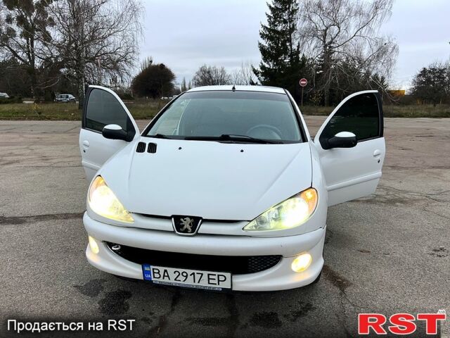 Білий Пежо 206, об'ємом двигуна 1.4 л та пробігом 229 тис. км за 2850 $, фото 11 на Automoto.ua