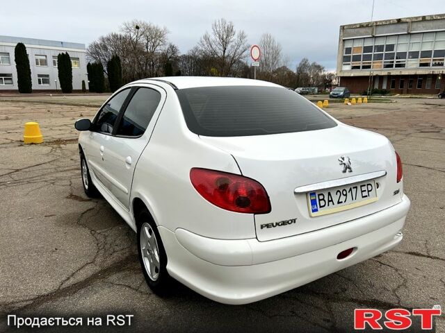 Білий Пежо 206, об'ємом двигуна 1.4 л та пробігом 229 тис. км за 2850 $, фото 1 на Automoto.ua