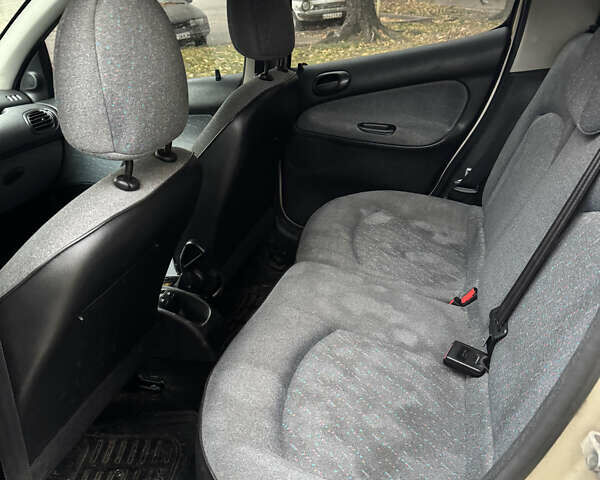 Бежевый Пежо 206, объемом двигателя 1.59 л и пробегом 179 тыс. км за 3300 $, фото 7 на Automoto.ua