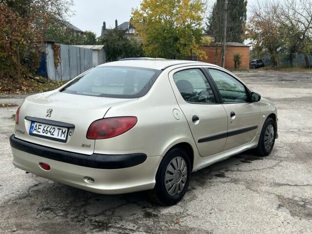Бежевий Пежо 206, об'ємом двигуна 1.4 л та пробігом 377 тис. км за 2600 $, фото 3 на Automoto.ua