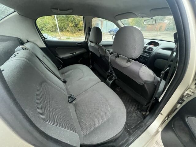 Бежевий Пежо 206, об'ємом двигуна 1.4 л та пробігом 377 тис. км за 2600 $, фото 5 на Automoto.ua