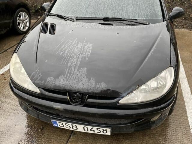 Черный Пежо 206, объемом двигателя 1.6 л и пробегом 237 тыс. км за 700 $, фото 1 на Automoto.ua