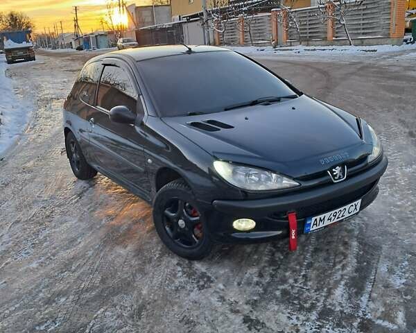 Чорний Пежо 206, об'ємом двигуна 1.4 л та пробігом 380 тис. км за 4200 $, фото 8 на Automoto.ua